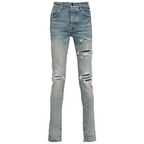 FLEX SHOP Amiri clay indigo distressed jeans with whiskering, front rips, and contrast underlay detailing.