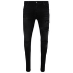 FLEX SHOP Amiri vintage black distressed denim jeans with rips and whiskering details.