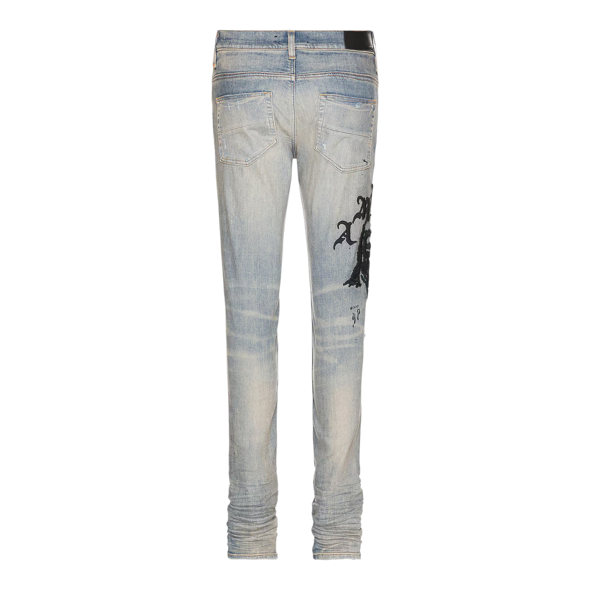 FLEX SHOP Amiri Wes Lang Reaper jeans in clay indigo blue denim with black graphic print, back view.