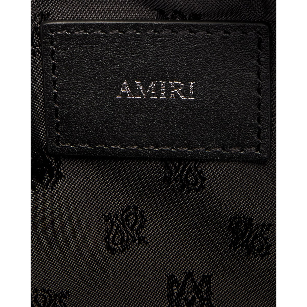 FLEX SHOP Amiri black messenger bag interior leather logo patch with embossed branding and monogram fabric lining
