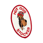 FLEX SHOP oval embroidered patch featuring a cartoon dog wearing sunglasses with Hot Dog Stocker text in red