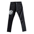 FLEX SHOP Amiri black skinny jeans with distressed denim, crystal Hollywood logo, and tapered fit.