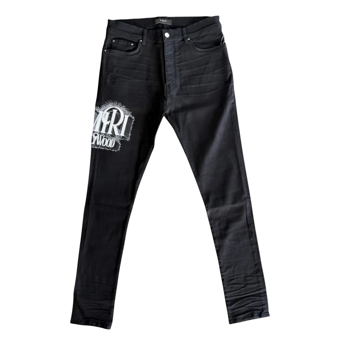 FLEX SHOP Amiri black skinny jeans with distressed denim, crystal Hollywood logo, and tapered fit.