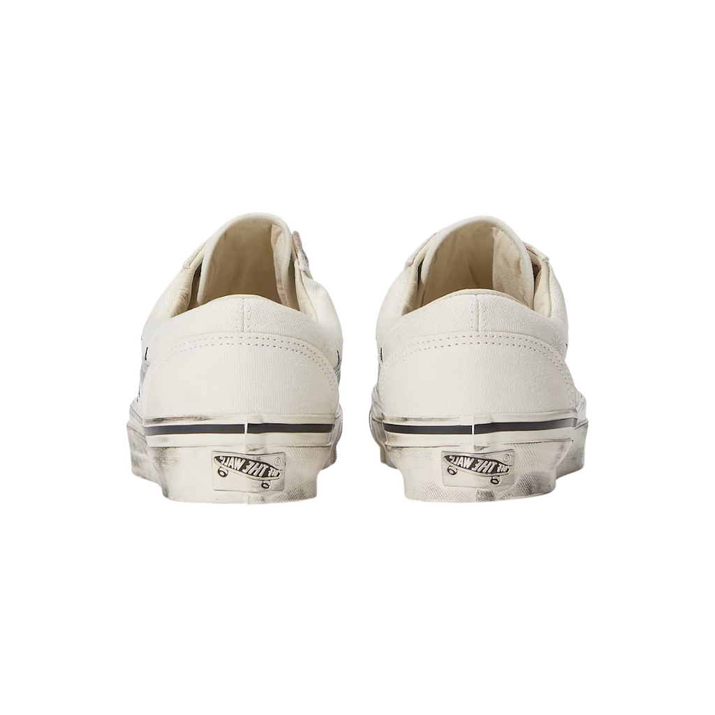 FLEX SHOP Vans Premium Old Skool LX sneakers in white, rear view showing distressed rubber soles and heel logos.
