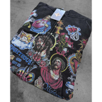 FLEX SHOP black zip-up hoodie featuring vibrant Risen King religious graphic prints and a full-length front zipper.
