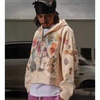 FLEX SHOP cream thermal zip-up hoodie featuring colorful religious graphic prints on a model outdoors