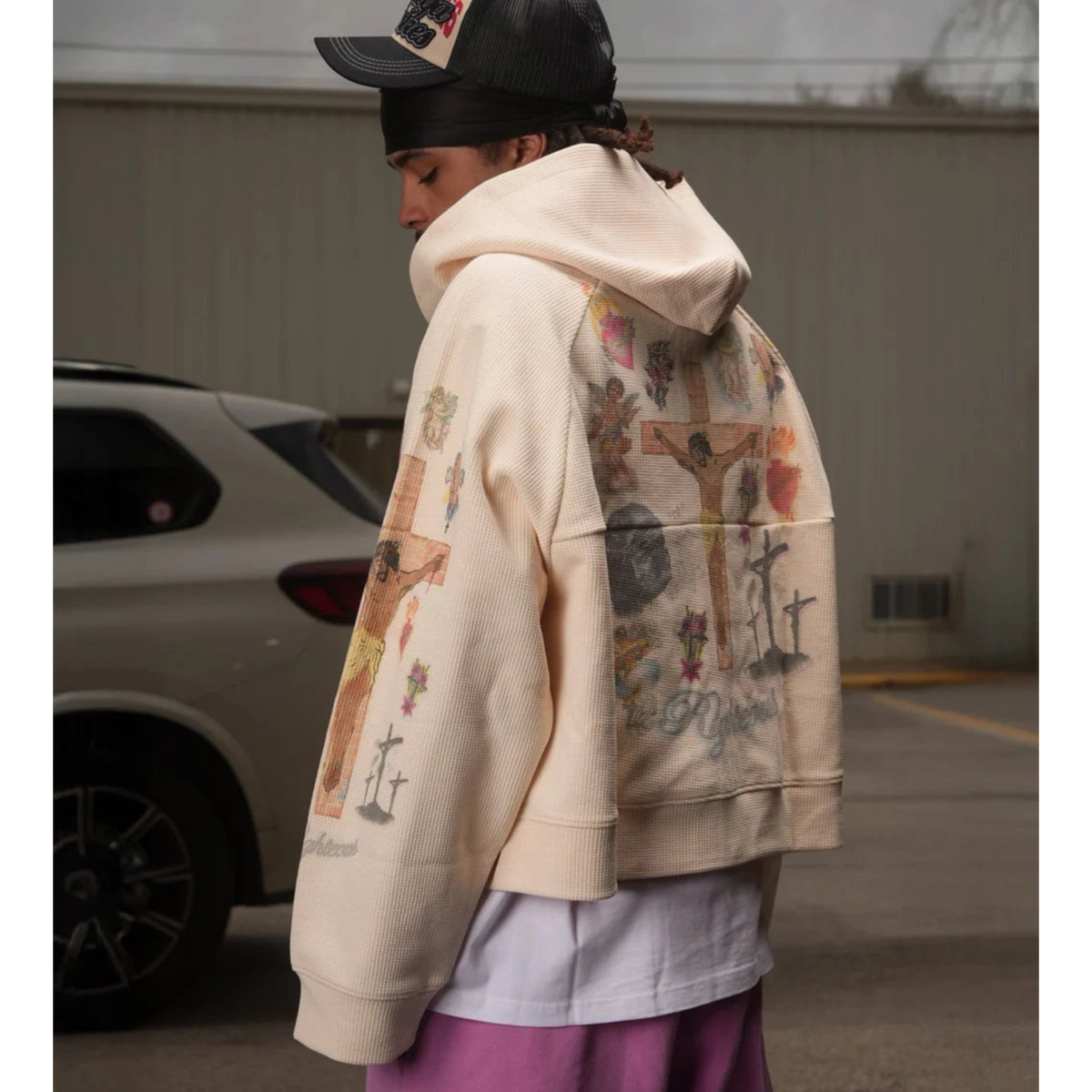 FLEX SHOP Righteous Ultimate Sacrifice cream thermal zip-up hoodie with detailed religious graphic print on the back.