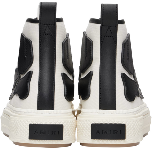 FLEX SHOP Amiri Skel Court high-top sneakers in white canvas and black leather with heel logo patches, rear view.