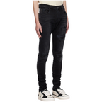 FLEX SHOP Amiri vintage black distressed denim jeans with rips, whiskering, and embroidered leg accents