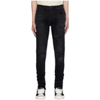 FLEX SHOP Amiri vintage black distressed denim jeans with ripped knees and embroidered varsity repair details
