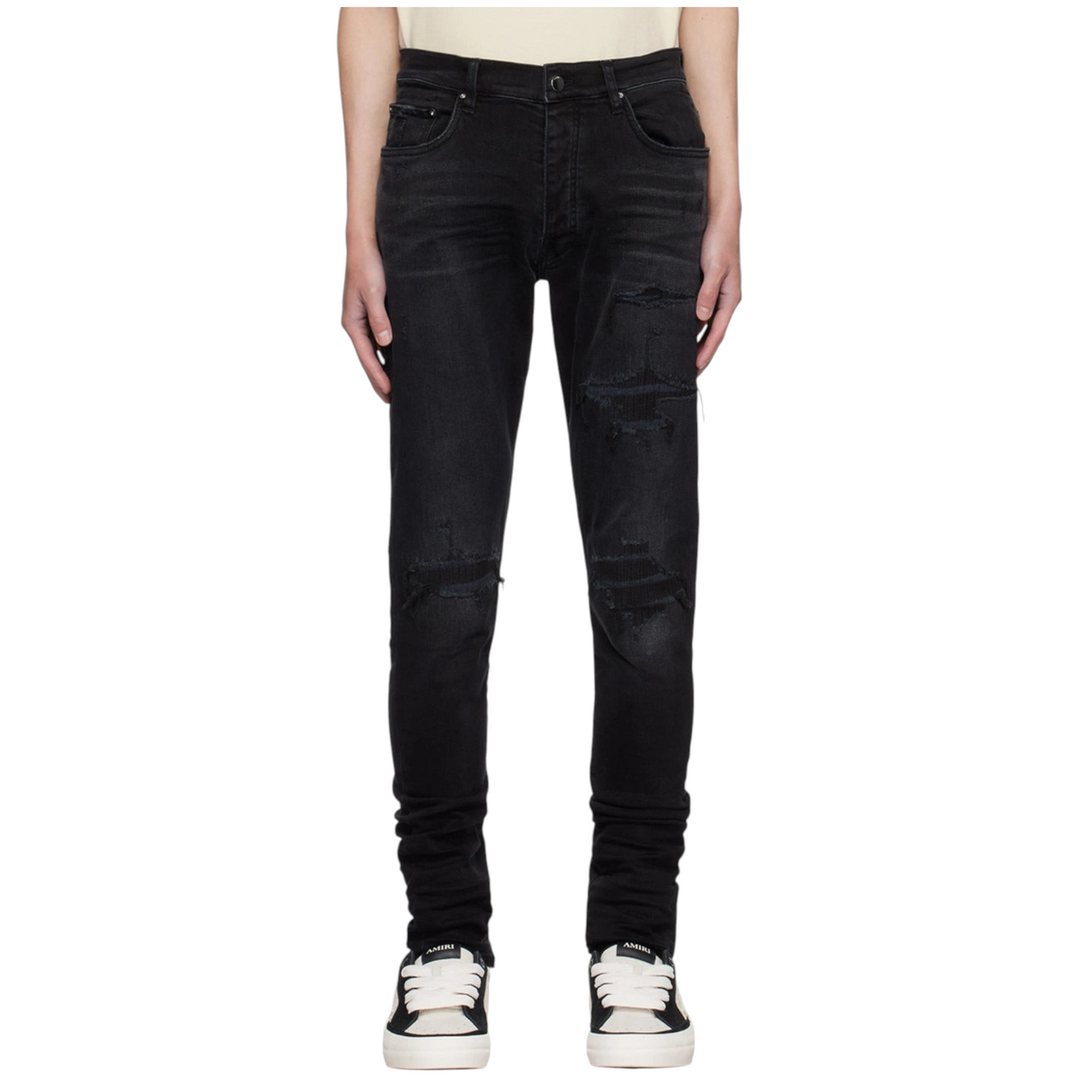 FLEX SHOP Amiri vintage black distressed denim jeans with ripped knees and embroidered varsity repair details
