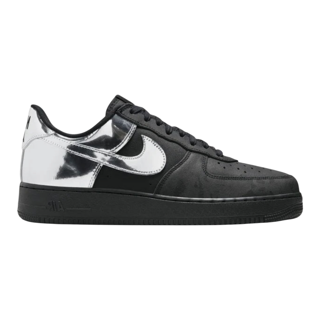 FLEX SHOP Nike Air Force 1 Low All-Star 2025 sneaker in black suede with metallic silver Swoosh and camo detailing.